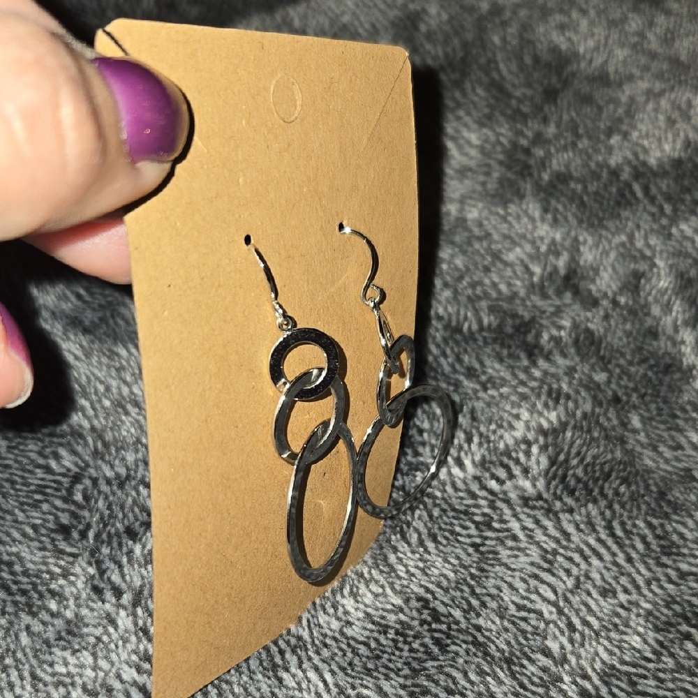 Elegant Silver Hoop Earrings - Picture 3 of 3